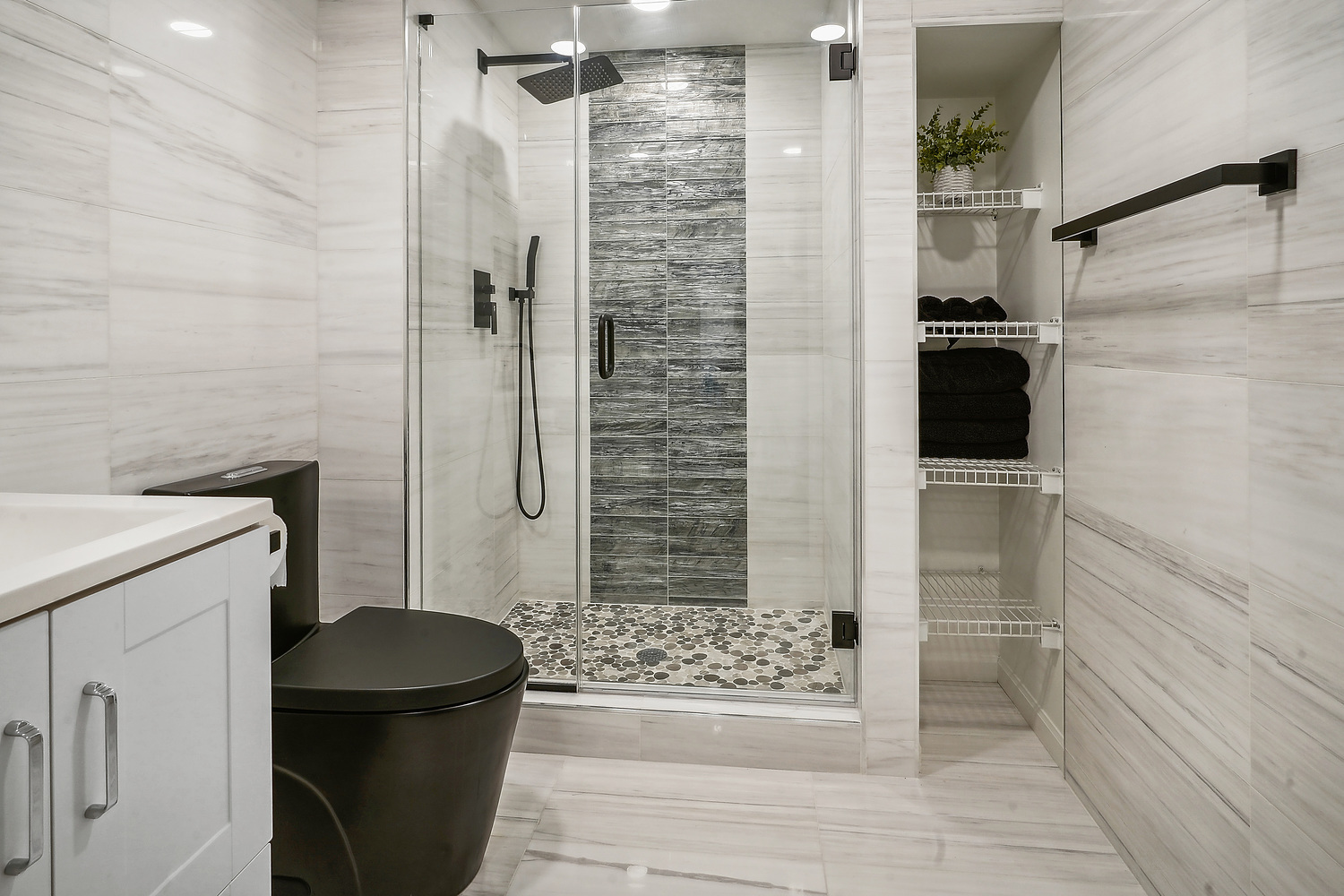 9033 Kearney Road Darien, IL 60561 - Photo 38 of 38 a bathroom with a granite countertop shower and a toilet
