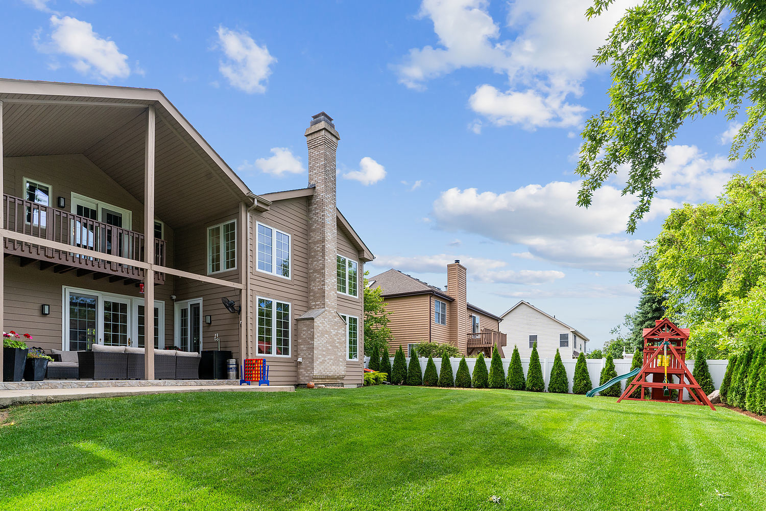 9033 Kearney Road Darien, IL 60561 - Photo 7 of 38 a view of a house with a yard and sitting area
