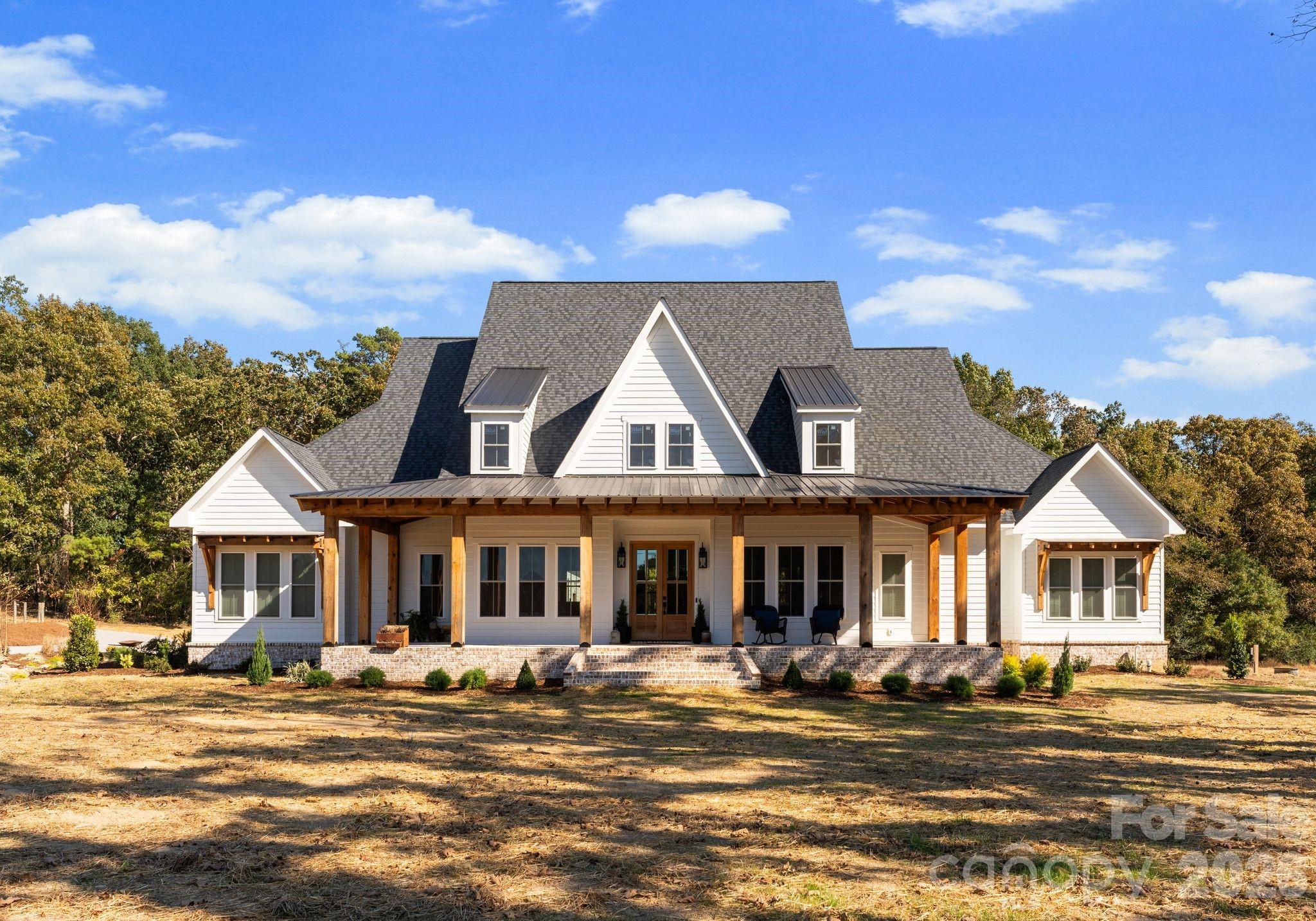 3760 Cappadocia Church Road Polkton, NC 28135 - Photo 1 of 48 a front view of a residential houses with yard