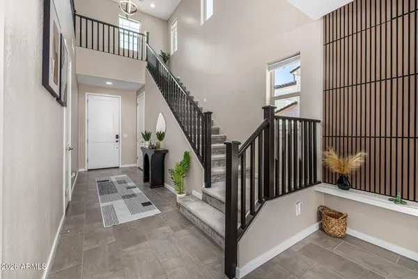 a view of staircase with white walls and stairs