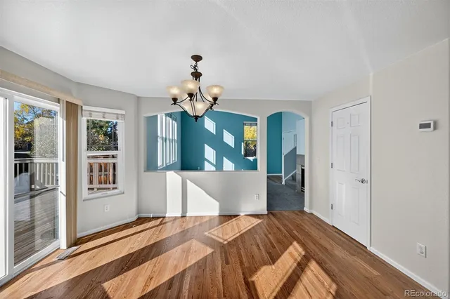 a bed room with a bed and a window