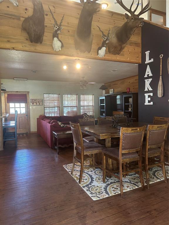 572 Oak Point Drive May, TX 76857 - Photo 20 of 36 Dining room with plenty of natural light and hardwood / wood-style flooring