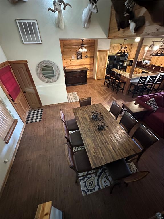 572 Oak Point Drive May, TX 76857 - Photo 4 of 36 Dining area with wood finished floors and baseboards