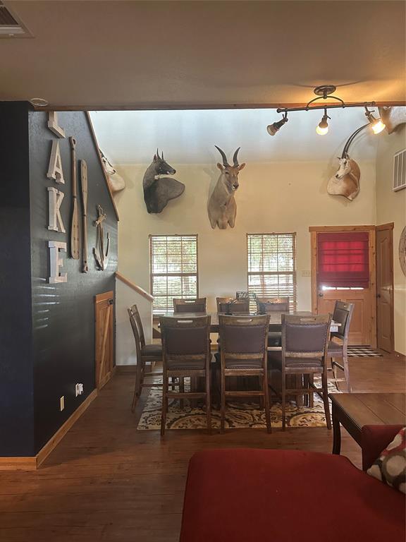 572 Oak Point Drive May, TX 76857 - Photo 9 of 36 Dining room with hardwood / wood-style flooring