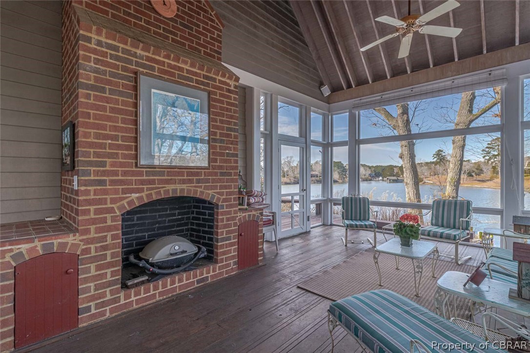 1028 Blueberry Point Road White Stone, VA 22578 - Photo 20 of 49 Cozy up by the Fireplace on a cool evening while still being able to enjoy the outside