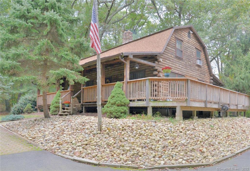 120 Red Oak Hill Road Farmington, CT 06032 - Photo 1 of 1 a front view of a house with a yard