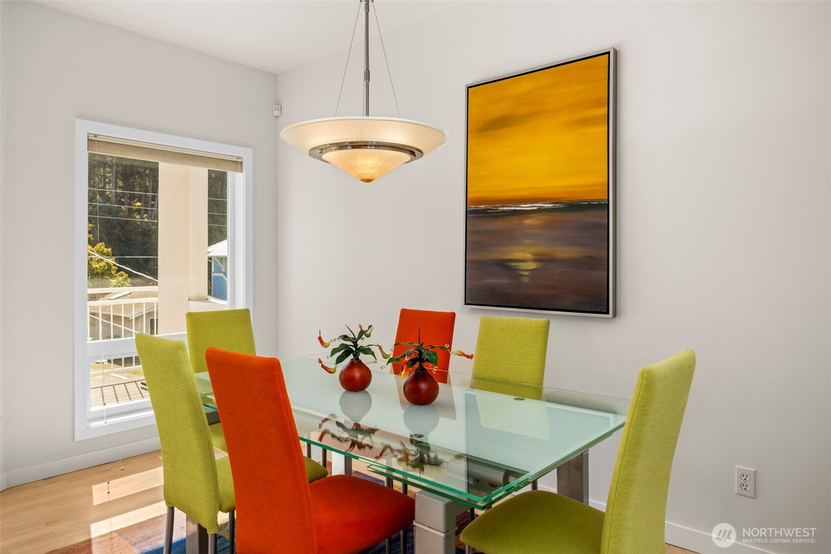 6436 South Ebb Tide Lane Freeland, WA 98249 - Photo 11 of 40 a view of a dining room with furniture and a window