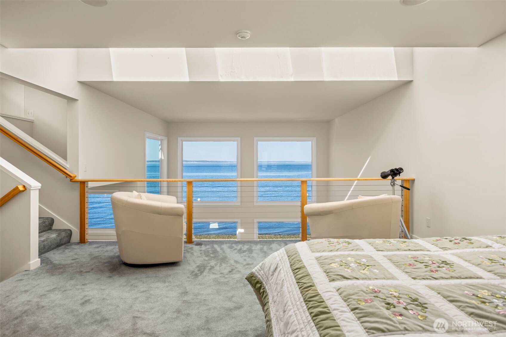 6436 South Ebb Tide Lane Freeland, WA 98249 - Photo 17 of 40 a bedroom with a bed and a window