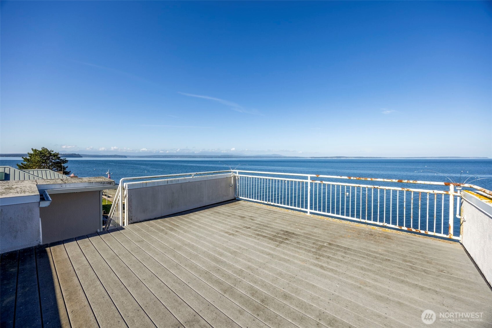 6436 South Ebb Tide Lane Freeland, WA 98249 - Photo 22 of 40 a view of a balcony with a sink
