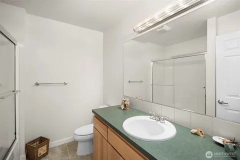 a view of a white house with a outdoor space