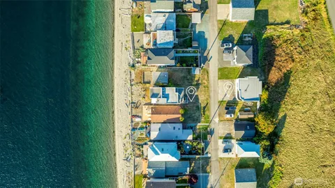 a bedroom with a bed and dresser