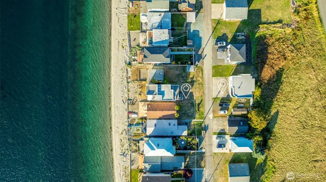 a bedroom with a bed and dresser