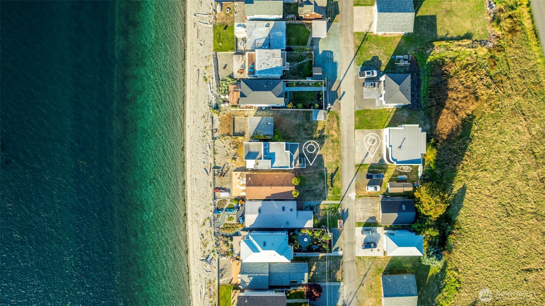 6436 South Ebb Tide Lane Freeland, WA 98249 - Photo 32 of 40 a city view with tall buildings