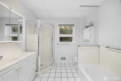 a view of a lake with outdoor seating