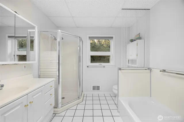 a view of a lake with outdoor seating