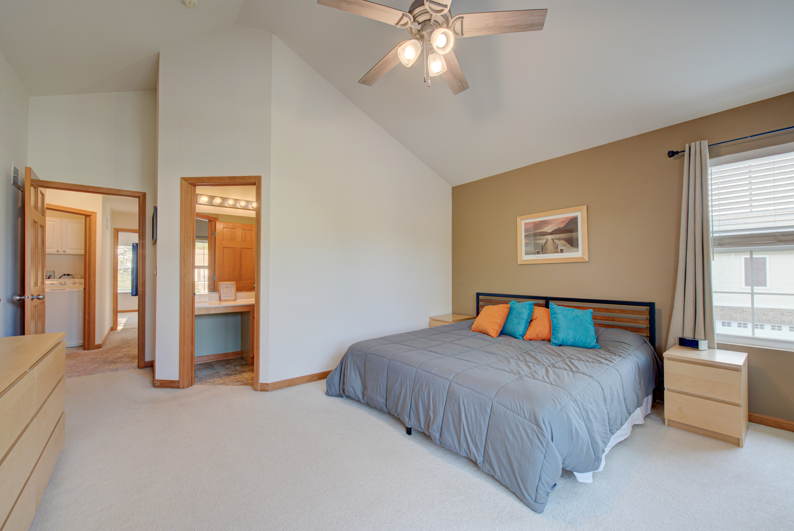 1430 Millbrook Drive Algonquin, IL 60102 - Photo 11 of 25 a bedroom with a bed and a chandelier