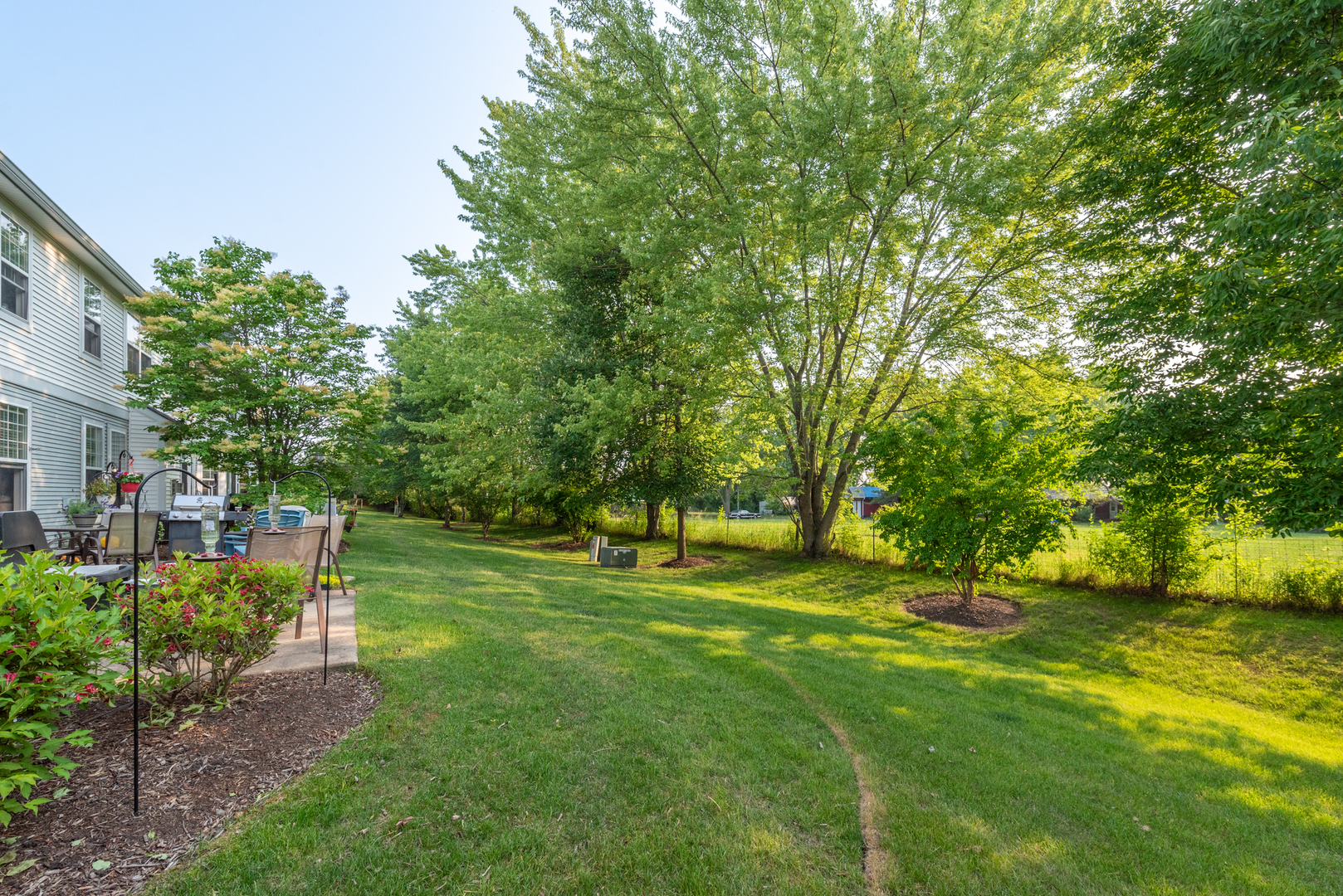 1430 Millbrook Drive Algonquin, IL 60102 - Photo 19 of 25 a view of a backyard with swimming pool