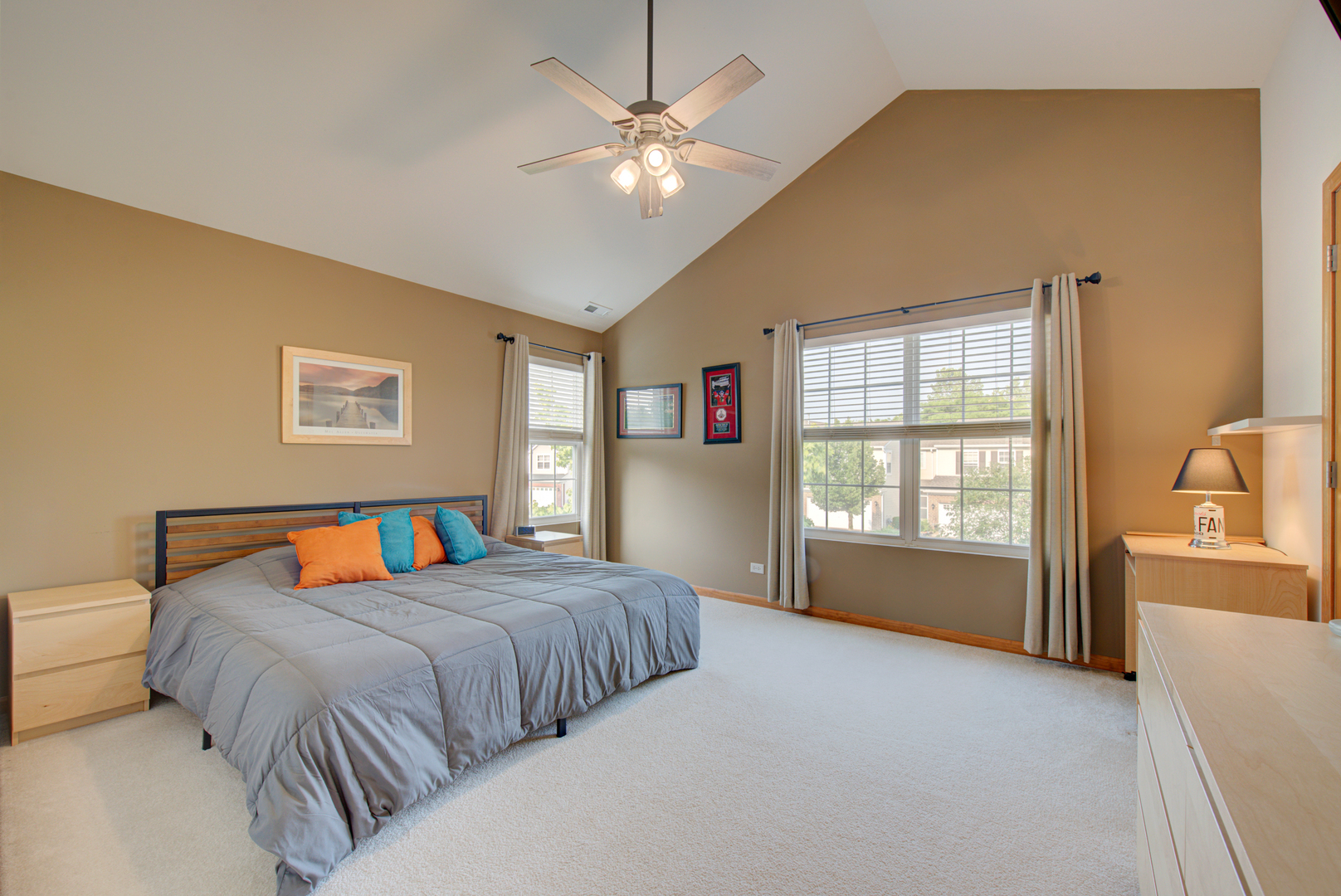 1430 Millbrook Drive Algonquin, IL 60102 - Photo 10 of 25 a bedroom with a large bed and a chandelier