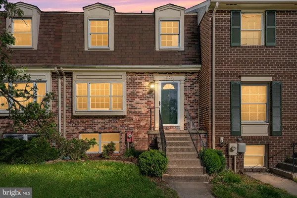 a front view of a house having yard
