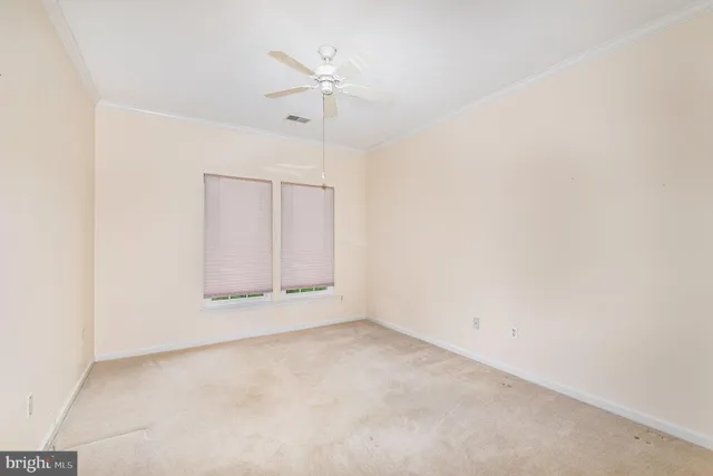 an empty room with a empty space and a window