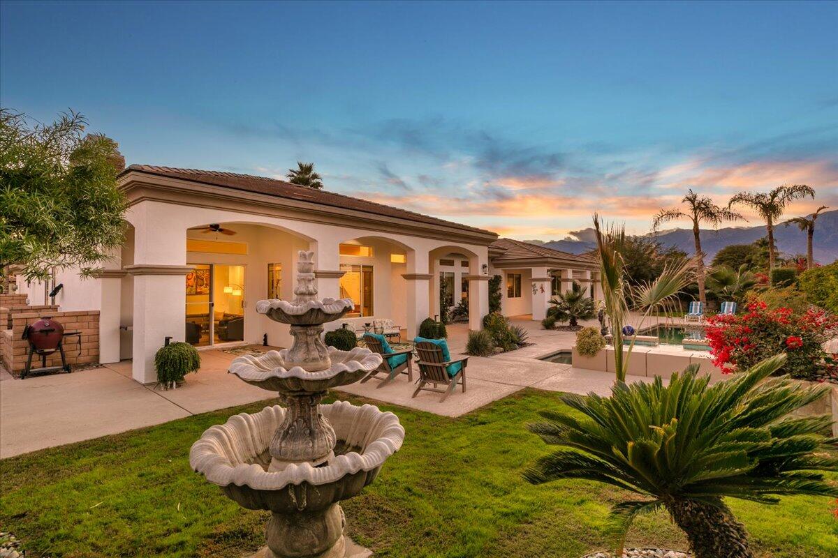 50 Toscana Way East Rancho Mirage, CA 92270 - Photo 13 of 87 014-Back View at Twilight