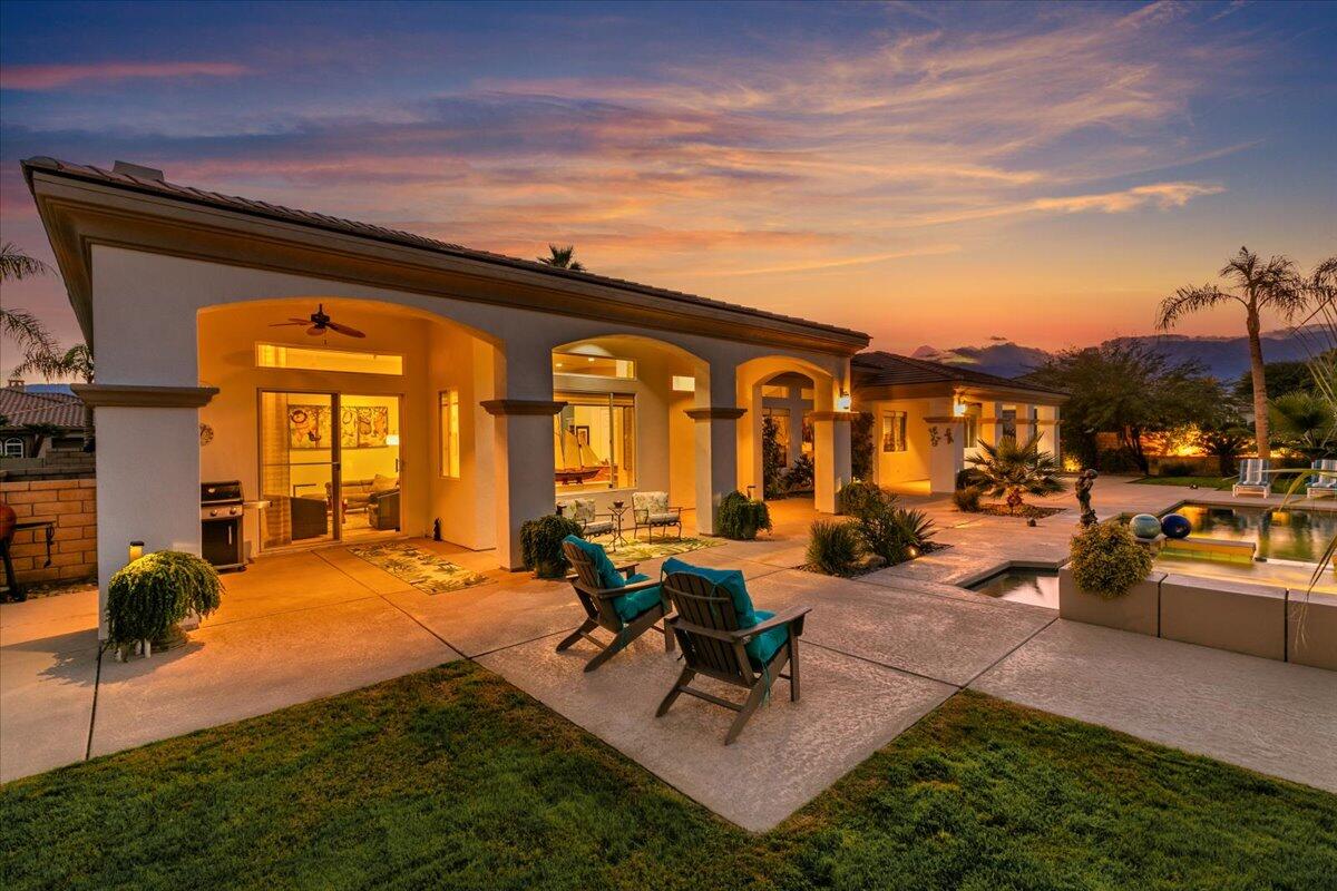 50 Toscana Way East Rancho Mirage, CA 92270 - Photo 15 of 87 016-Backyard at Twilight