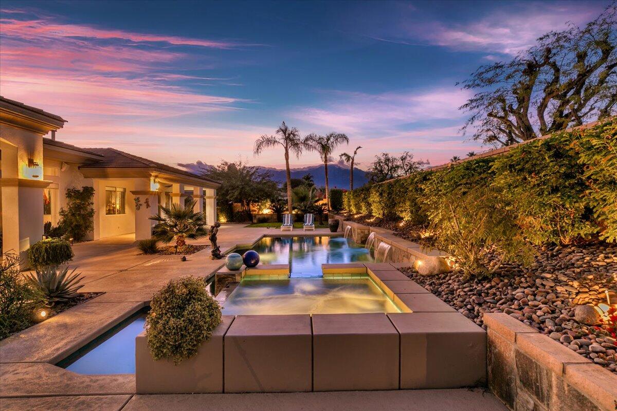 50 Toscana Way East Rancho Mirage, CA 92270 - Photo 16 of 87 a view of a swimming pool with outdoor seating