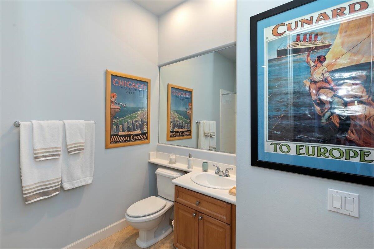 50 Toscana Way East Rancho Mirage, CA 92270 - Photo 47 of 87 a bathroom with a granite countertop sink mirror vanity and toilet
