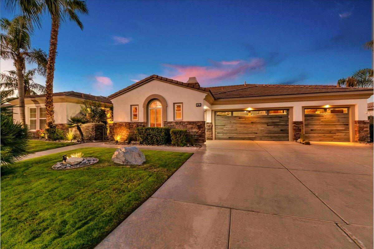 50 Toscana Way East Rancho Mirage, CA 92270 - Photo 7 of 87 008-Front of Home at Twilight