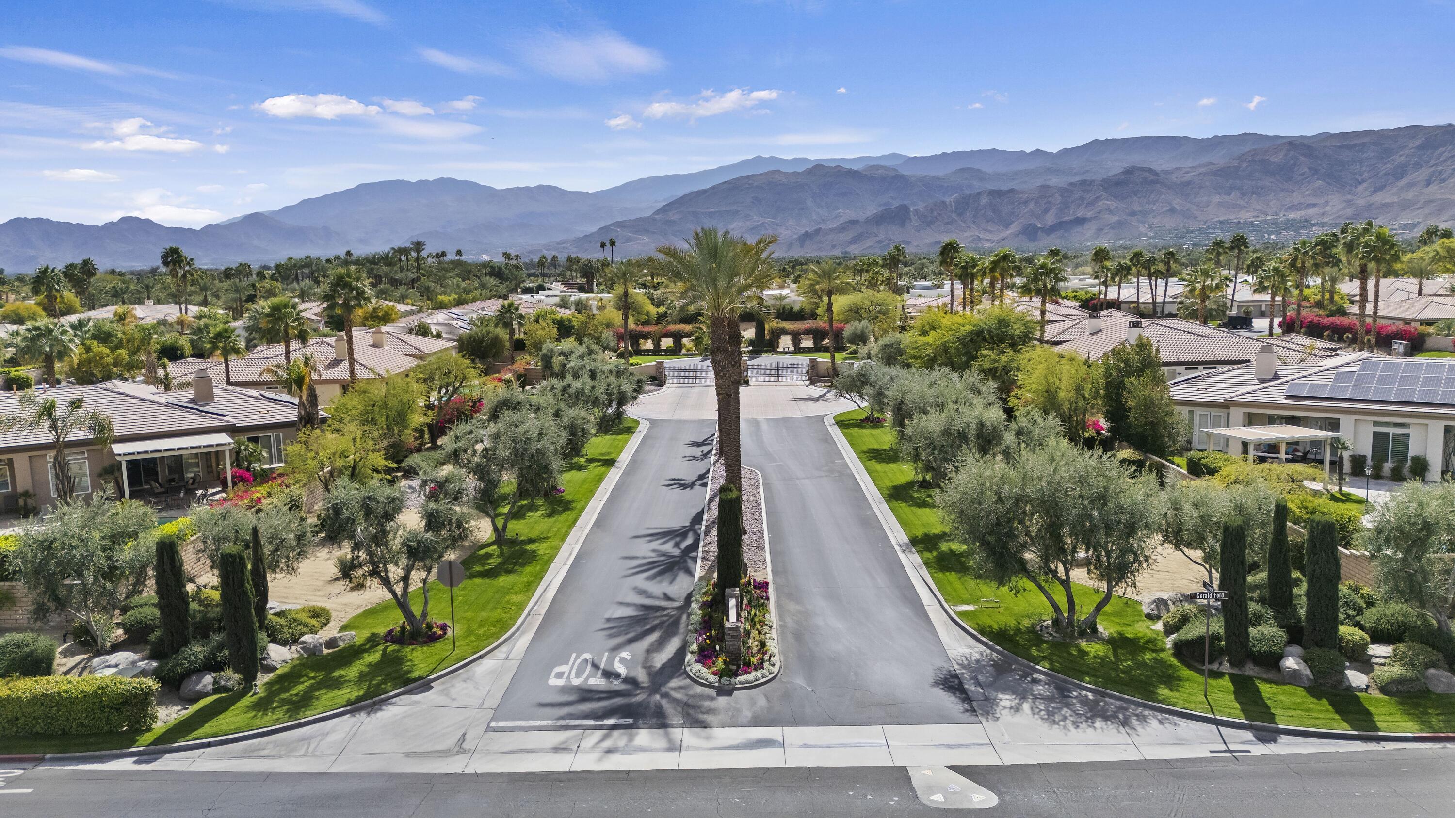 50 Toscana Way East Rancho Mirage, CA 92270 - Photo 85 of 87 a view of a city with a mountain