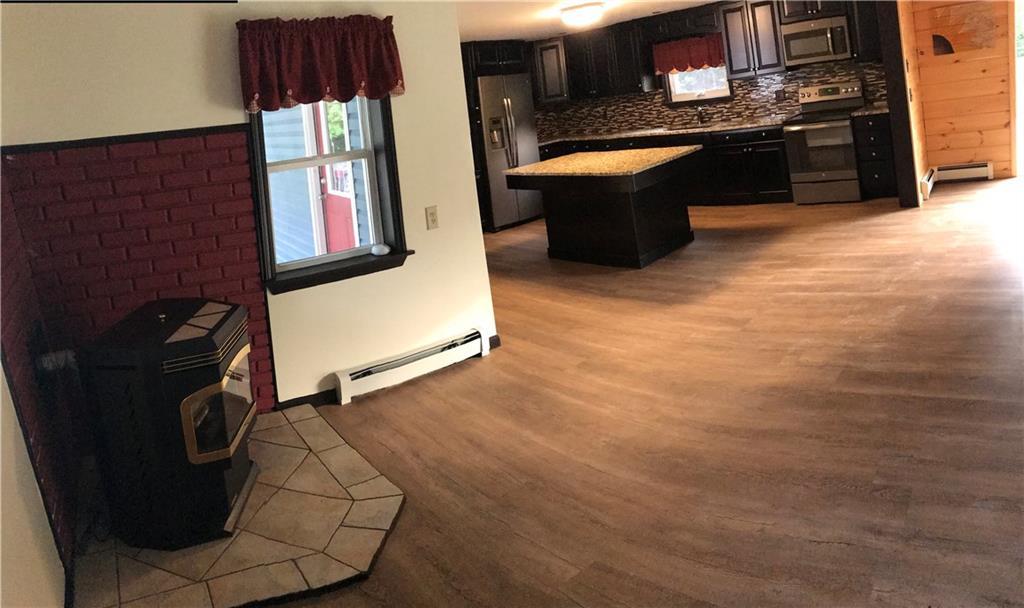 7 Masonic Road Dixmont, ME 04932 - Photo 4 of 28 Family Room with Harman Pellet Stove...