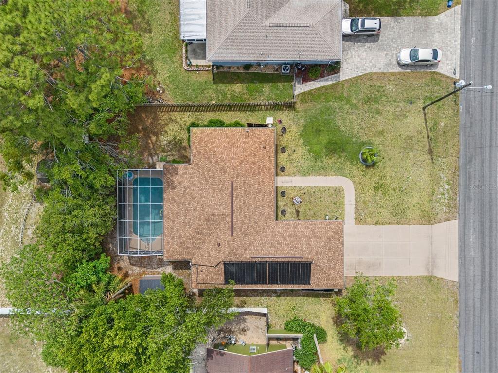 12292 Ronald Street Spring Hill, FL 34609 - Photo 18 of 18 an aerial view of a house with a yard