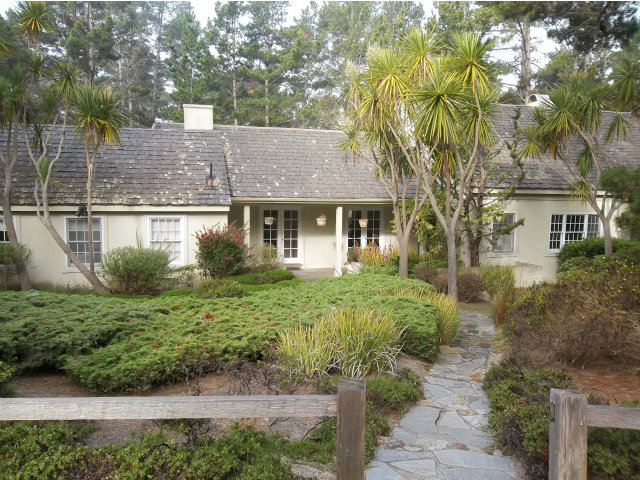 3132 Spruance Road Pebble Beach, CA 93953 - Photo 17 of 25 a front view of a house with a garden