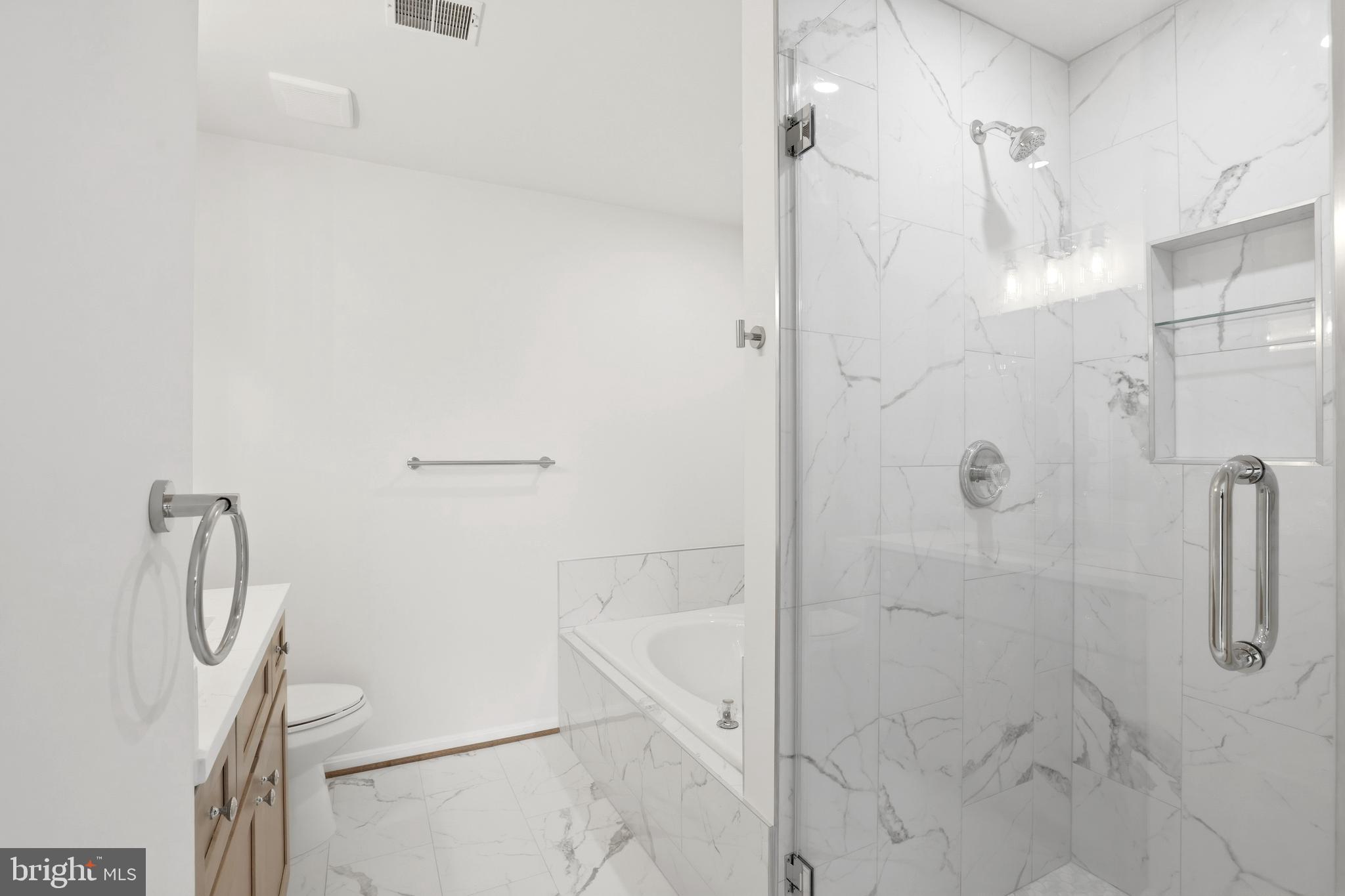 14275 Newbern Loop Gainesville, VA 20155 - Photo 15 of 35 a bathroom with a shower