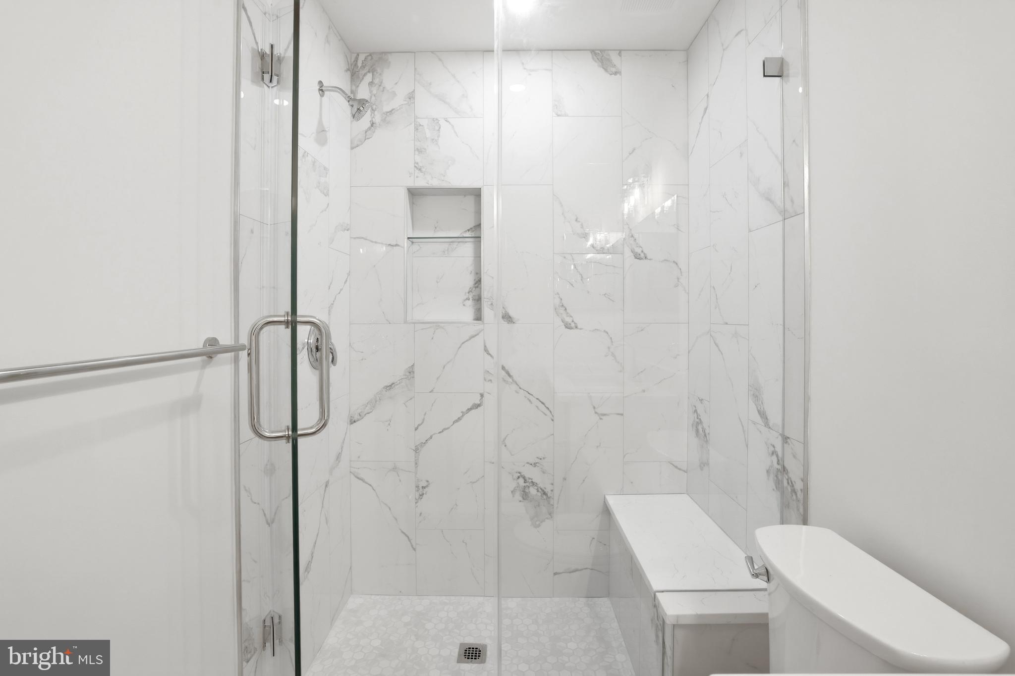 14275 Newbern Loop Gainesville, VA 20155 - Photo 22 of 35 a bathroom with a shower and toilet