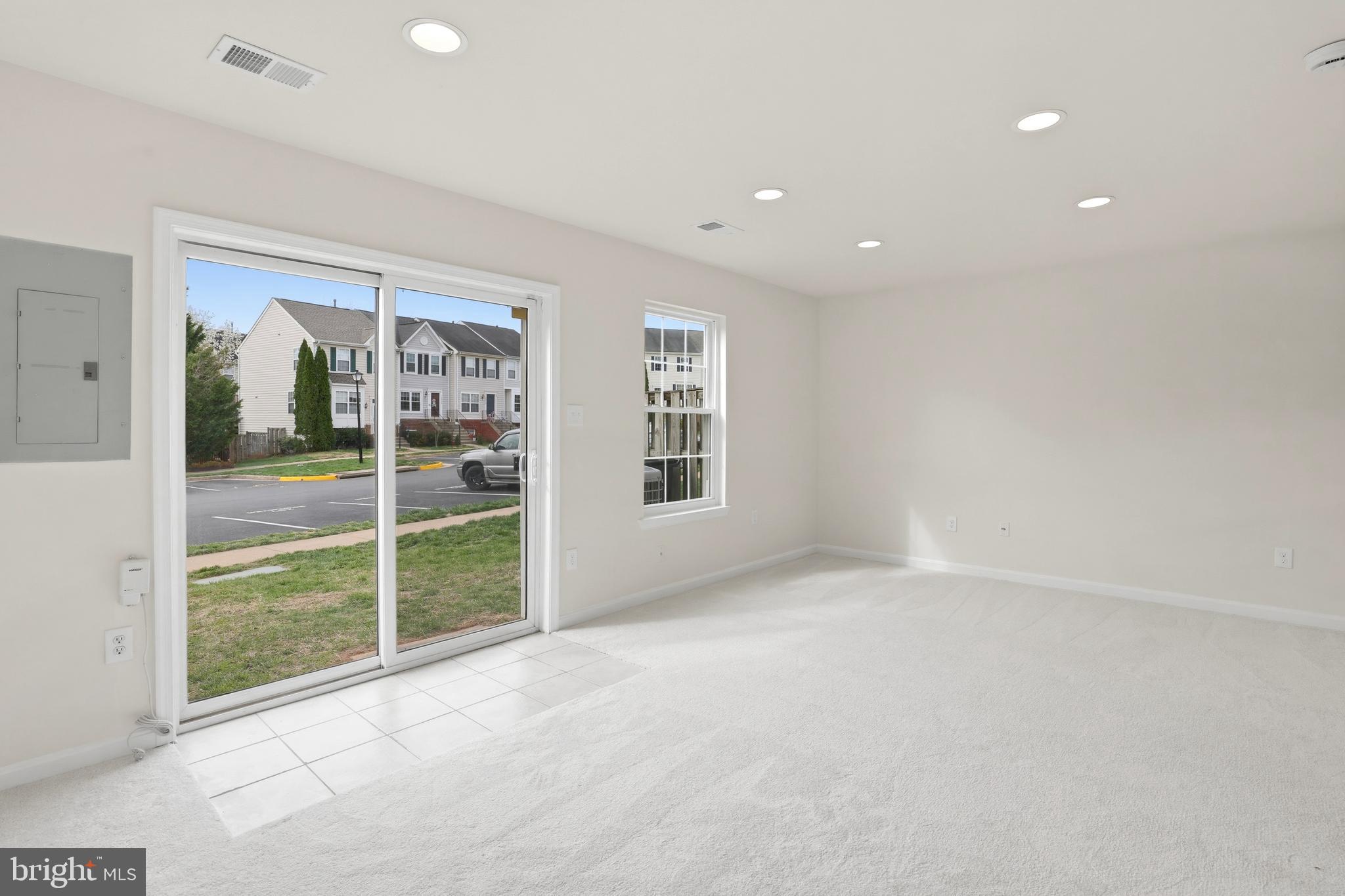 14275 Newbern Loop Gainesville, VA 20155 - Photo 27 of 35 a view of an empty room with a window