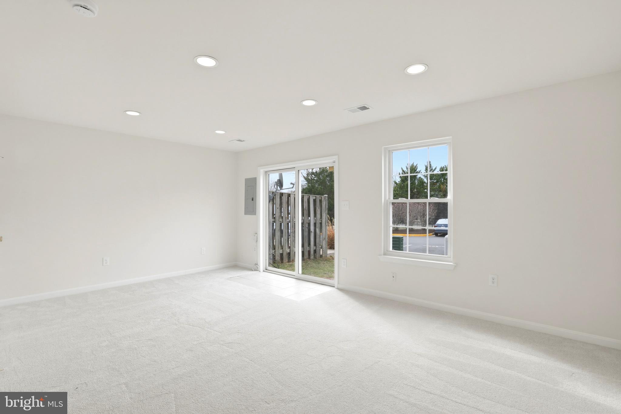14275 Newbern Loop Gainesville, VA 20155 - Photo 29 of 35 an empty room with windows