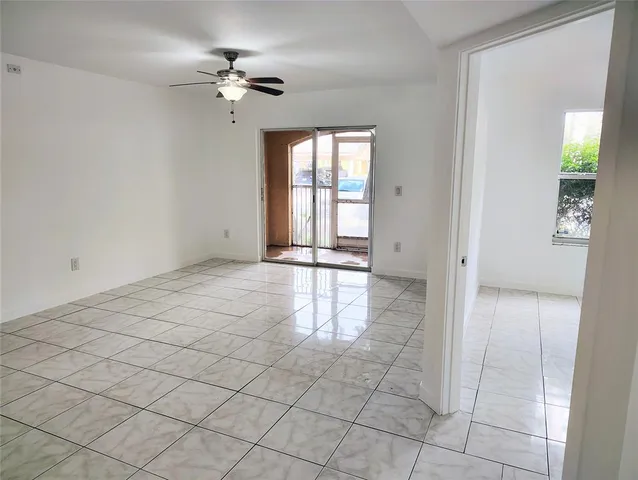 a view of an empty room and window