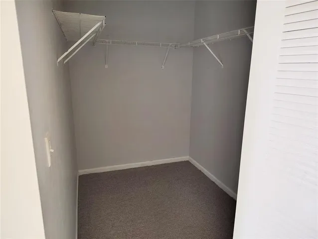 a view of house with outdoor space and swimming pool