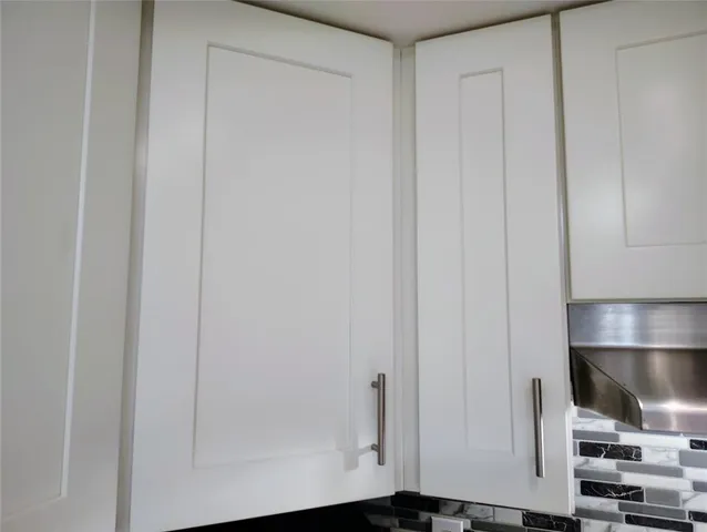 a view of kitchen with wooden floor