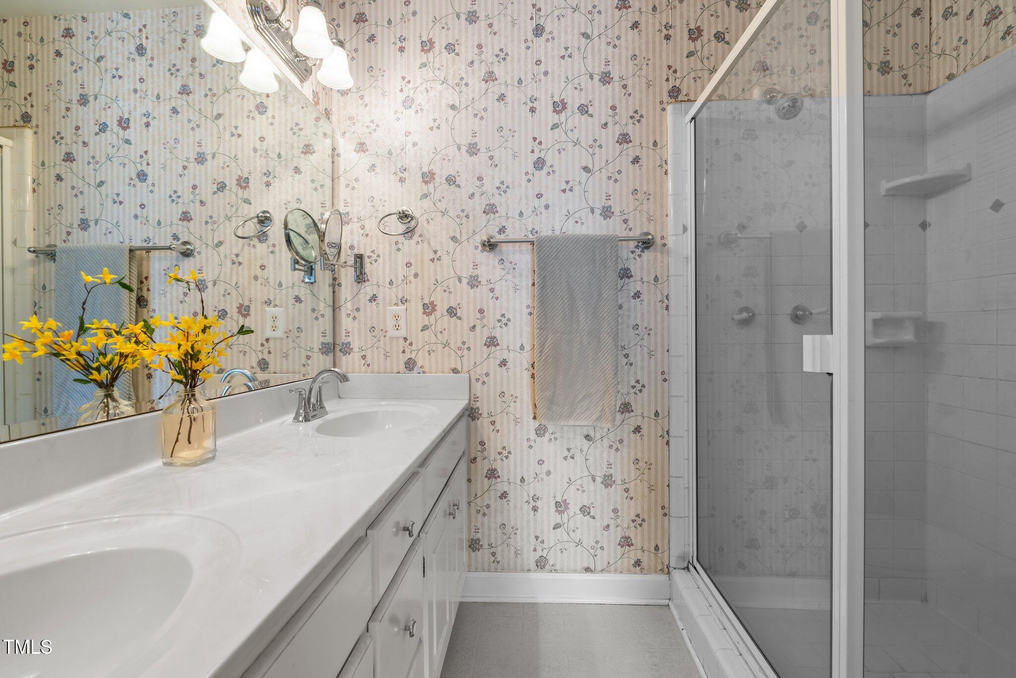 664 Marler Road Benson, NC 27504 - Photo 29 of 47 a bathroom with a sink and a mirror