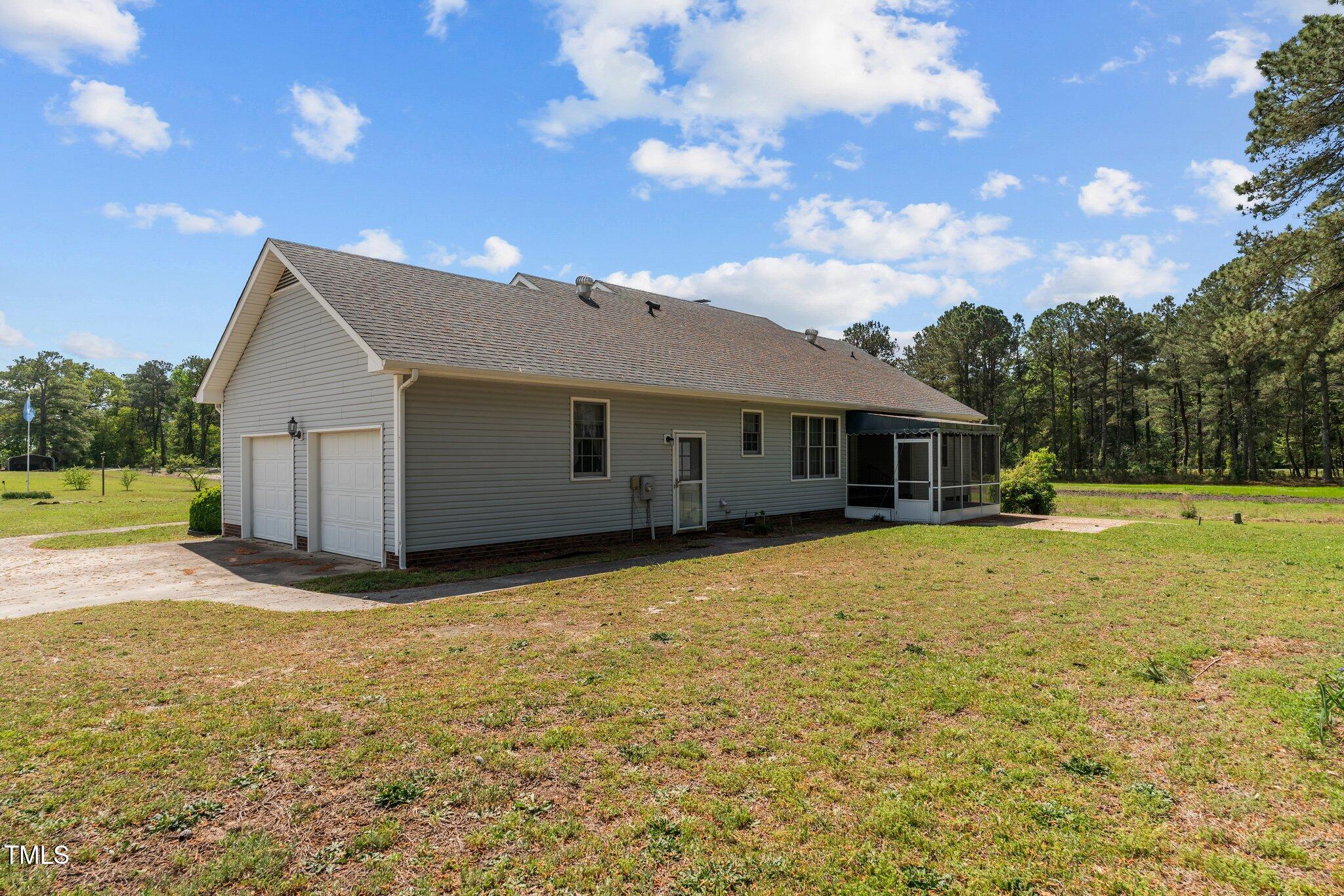664 Marler Road Benson, NC 27504 - Photo 5 of 47 a view of a house with a yard