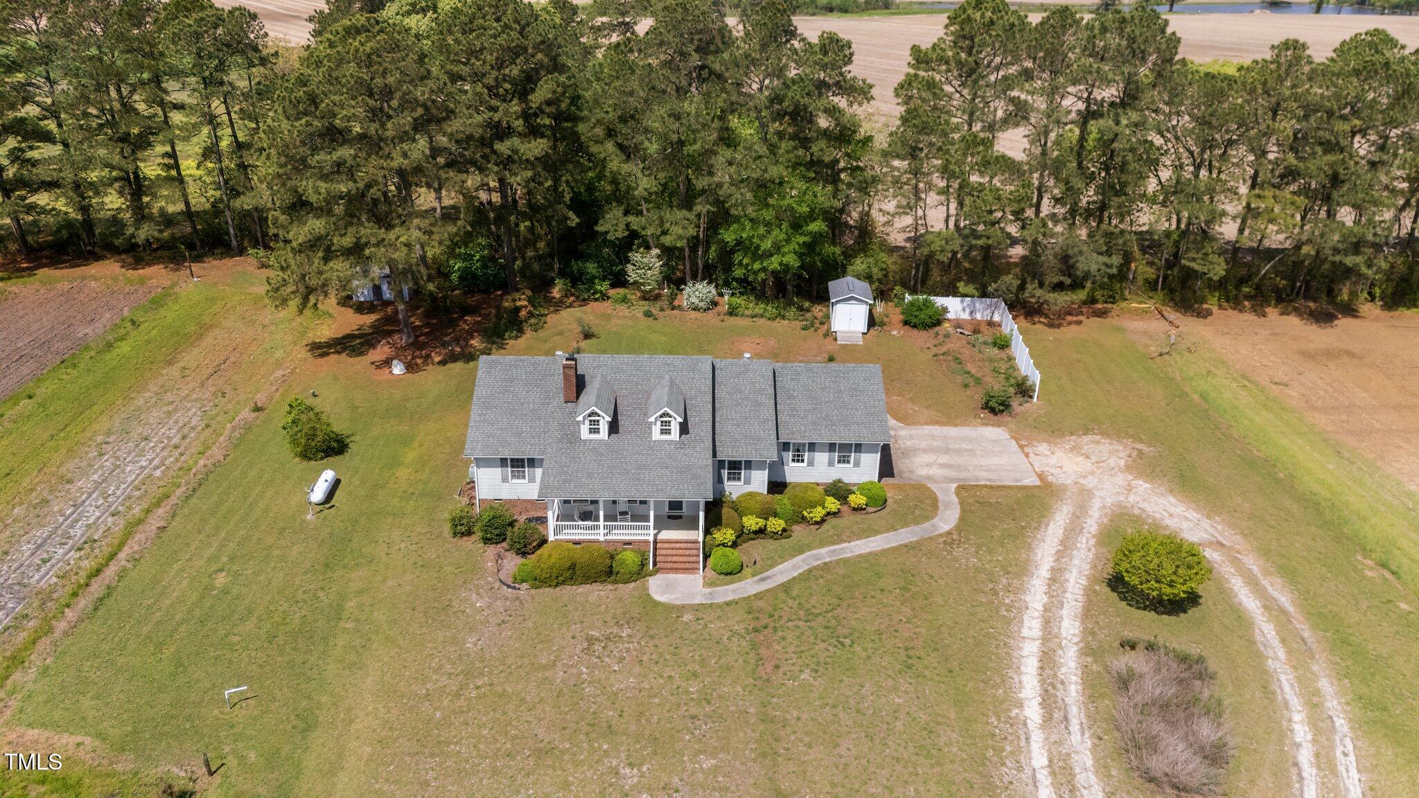 664 Marler Road Benson, NC 27504 - Photo 9 of 47 an aerial view of residential houses with yard