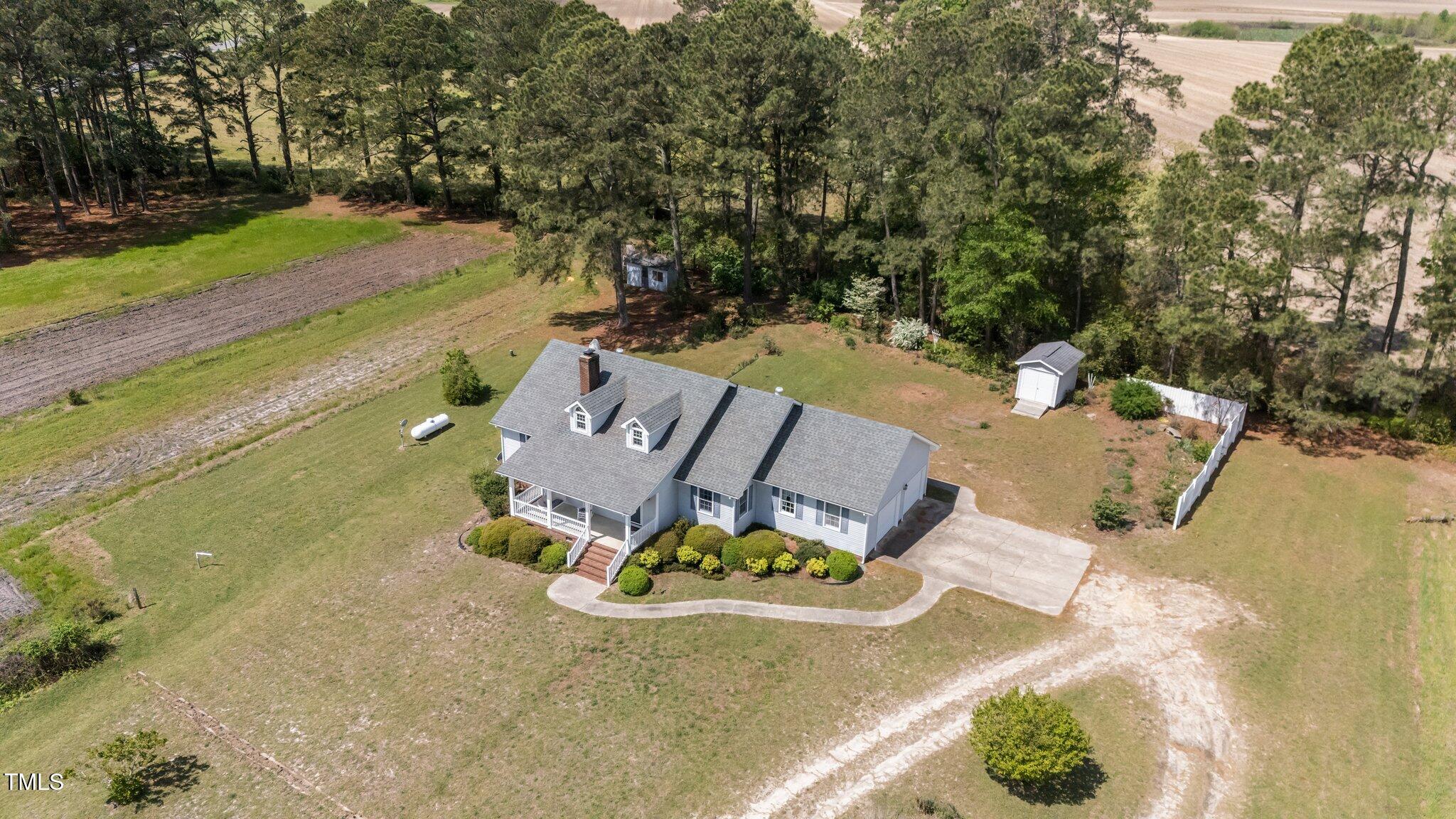 664 Marler Road Benson, NC 27504 - Photo 10 of 47 a view of a swimming pool with lounge chairs