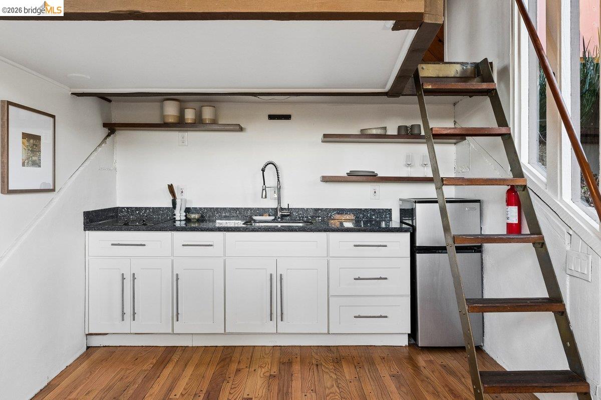 1049 Keith Avenue Berkeley, CA 94708 - Photo 63 of 79 a kitchen with a cabinets and window