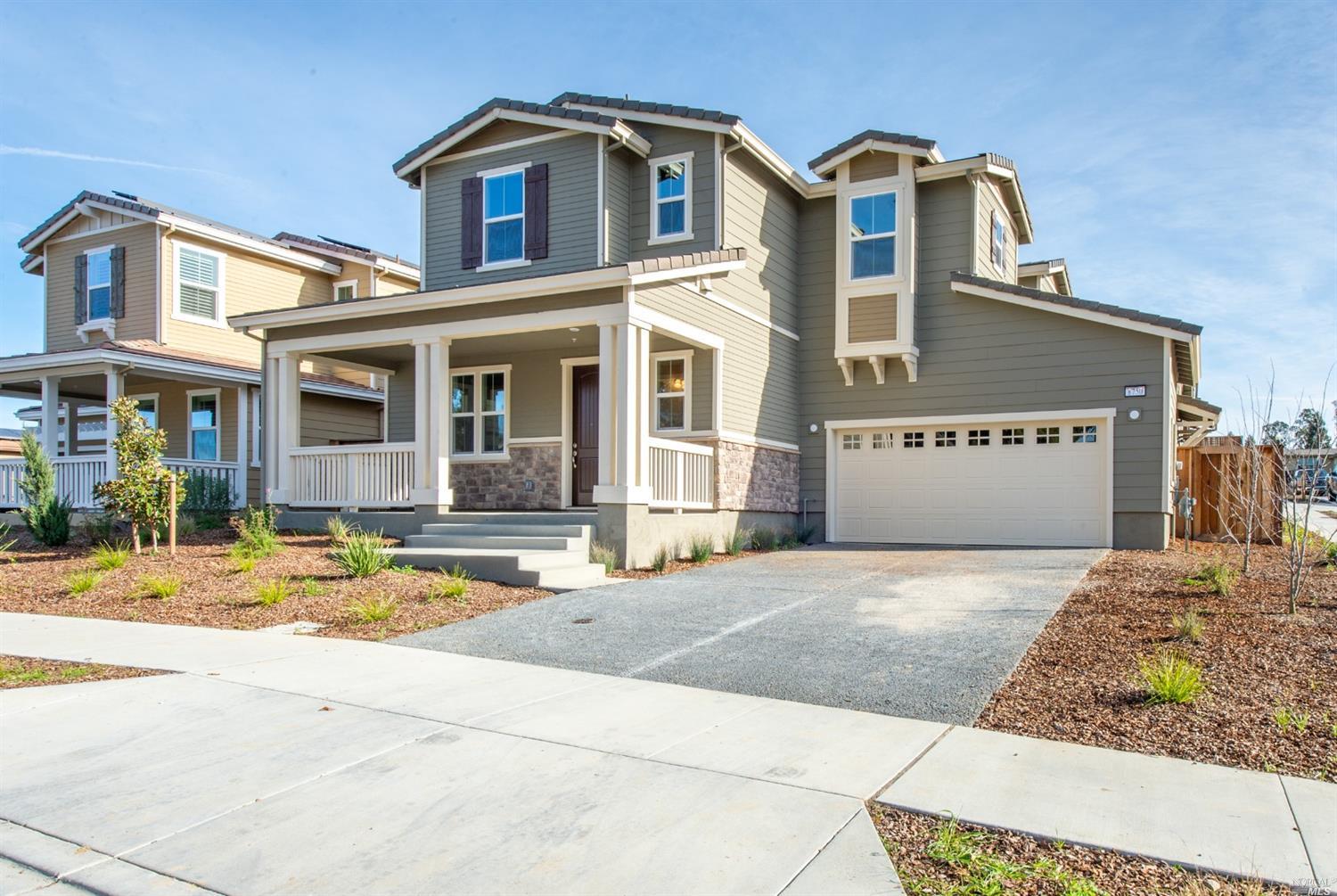 a view of a house with a street