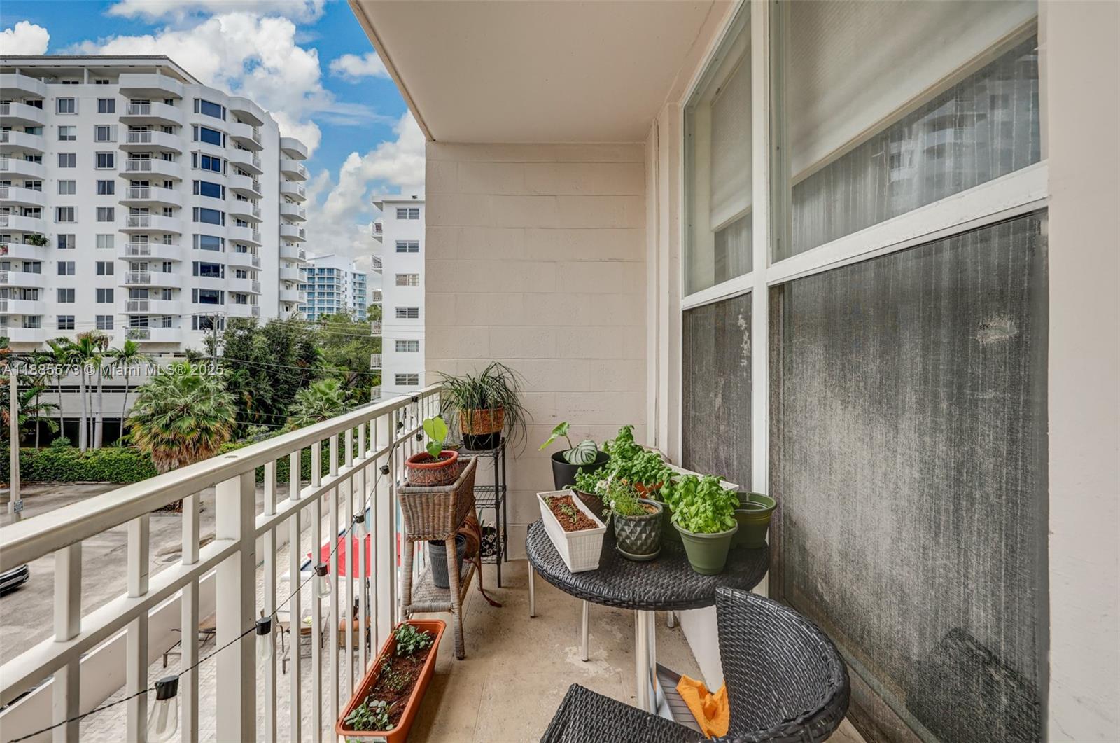 1300 Lincoln Road, Unit B402 Miami Beach, FL 33139 - Photo 23 of 34 a view of balcony with furniture