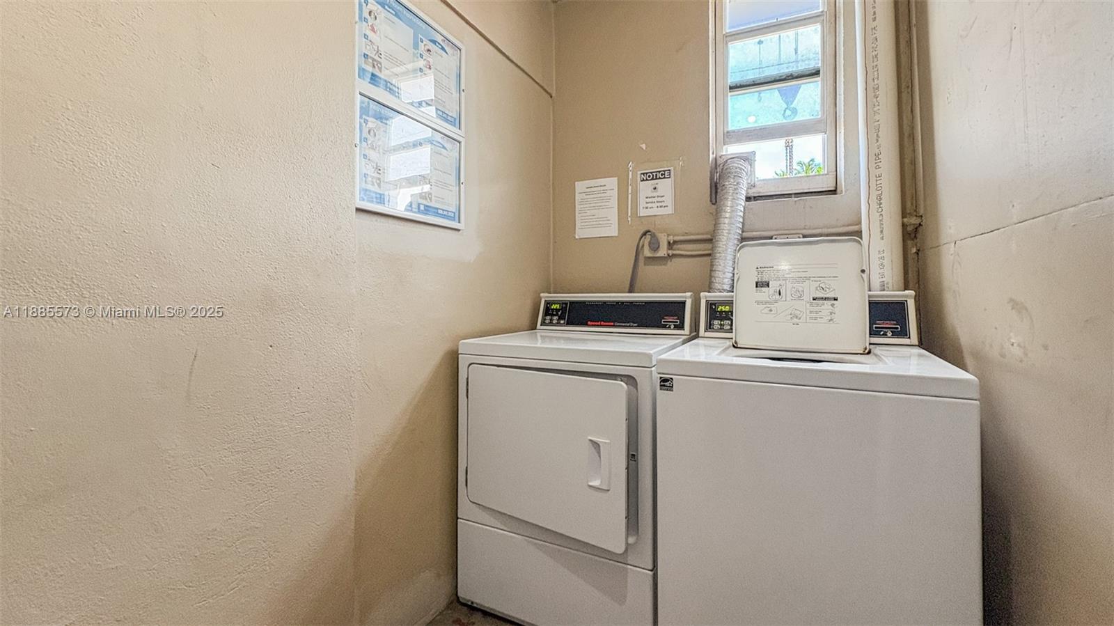 1300 Lincoln Road, Unit B402 Miami Beach, FL 33139 - Photo 25 of 34 a utility room with dryer and washer