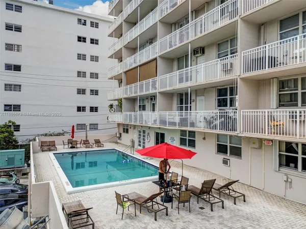 an aerial view of multi story residential apartment building