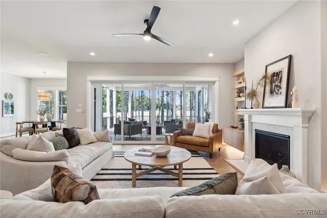 a kitchen with a table chairs stove and microwave